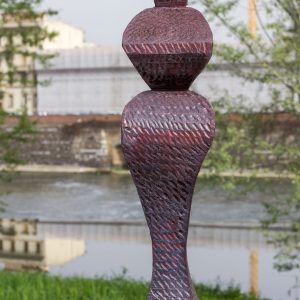 Rita sculpture on wood